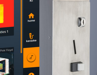 Stainless steel side of our touchscreen jukebox with coin acceptor